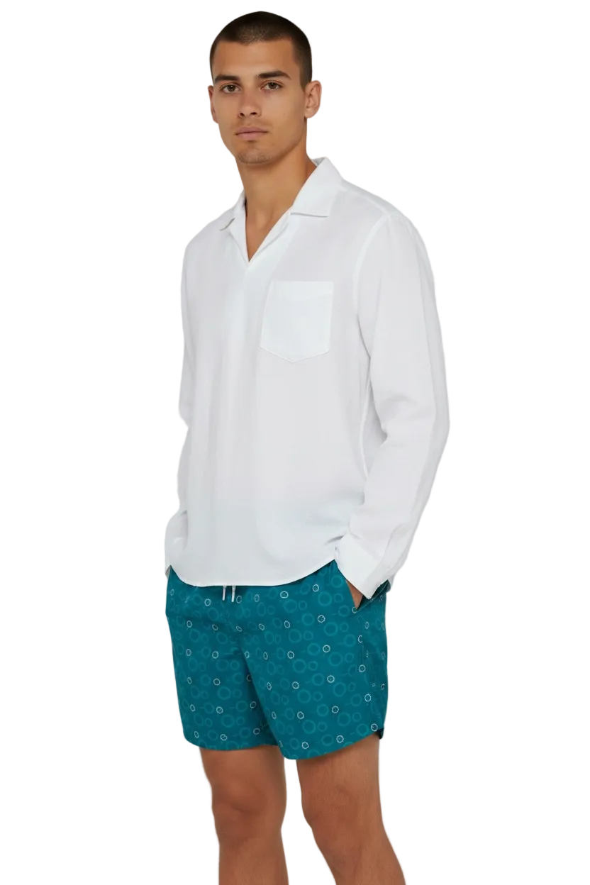 Red Sea Coast teal swim shorts styled with a white shirt, front view