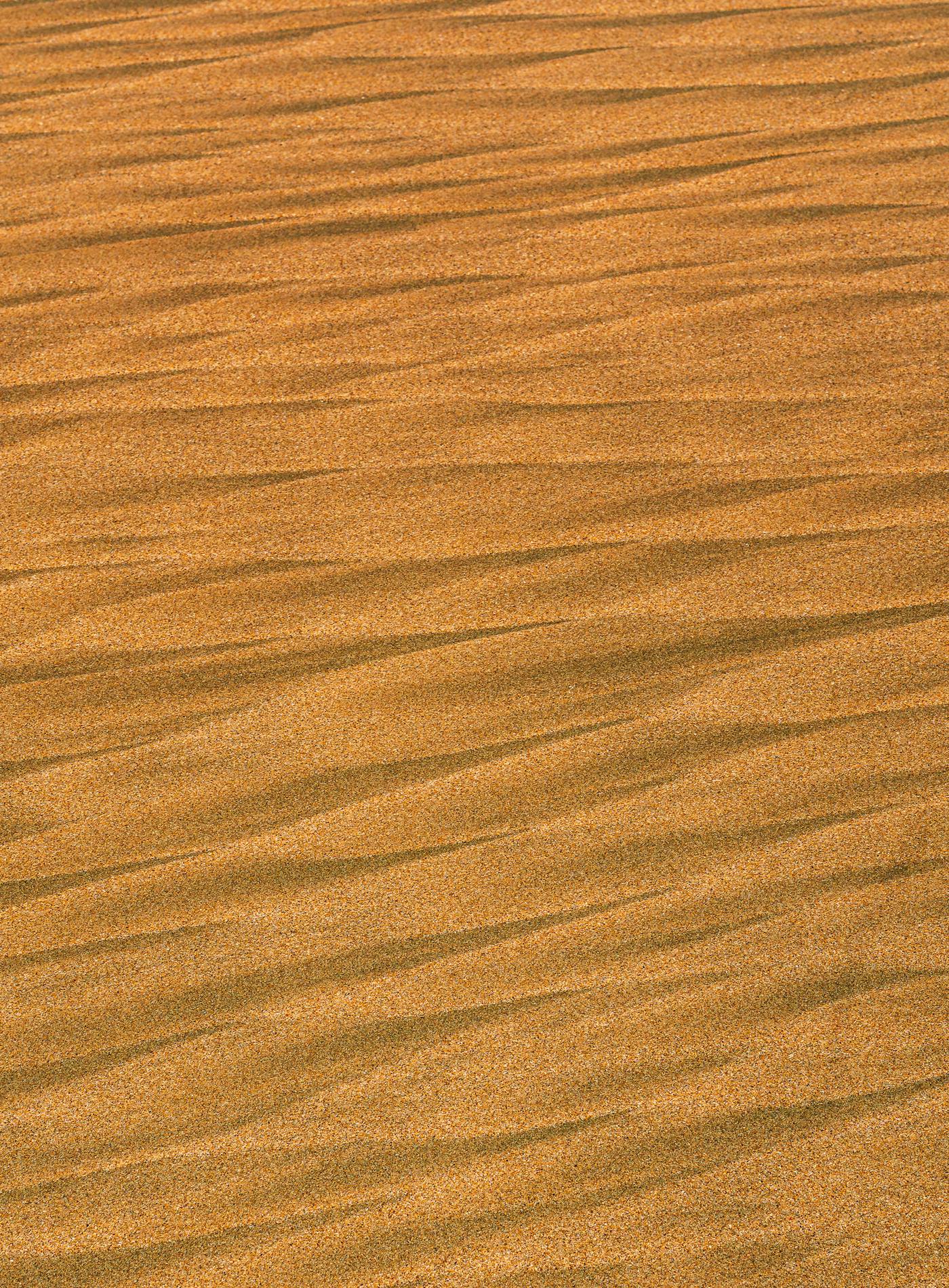Golden sand patterns Zihuatanejo beach